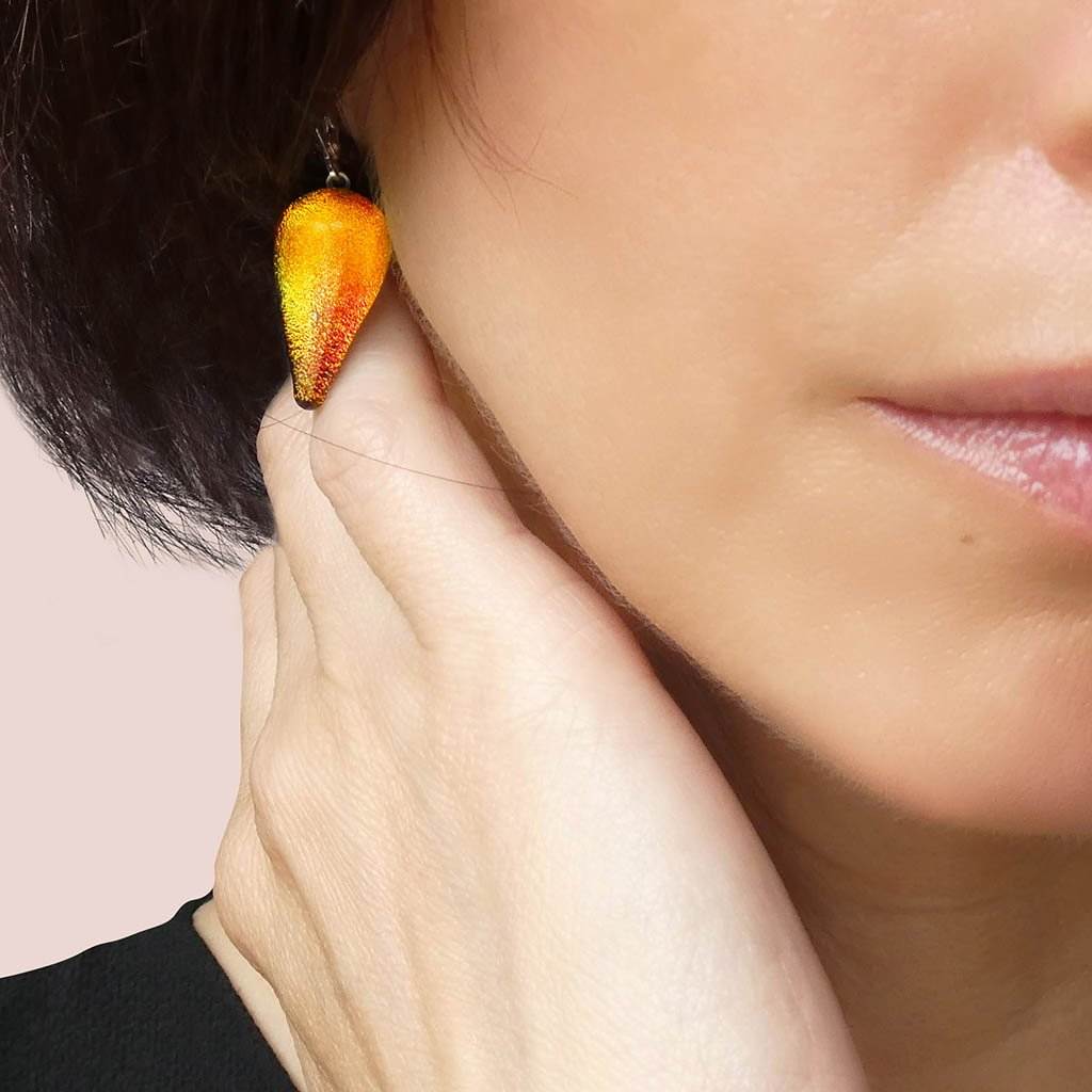 EARRINGS ORANGE GOLD ~ CRYSTAL GREEN | DROP | SILVER 925 | REFLET[proEARRINGS ORANGE GOLD ~ CRYSTAL GREENduct_vendor]MicrocosmosPRODUCT INFORMATION

Exclusive Microcosmoses Glass Reflet
Base: Sterling Silver 925

Bead size length: 20 mm / 0.8" |  width: 12 mm / 0.5"


Free Gift Box 


The   MEARRINGS DROP GLASS REFLET