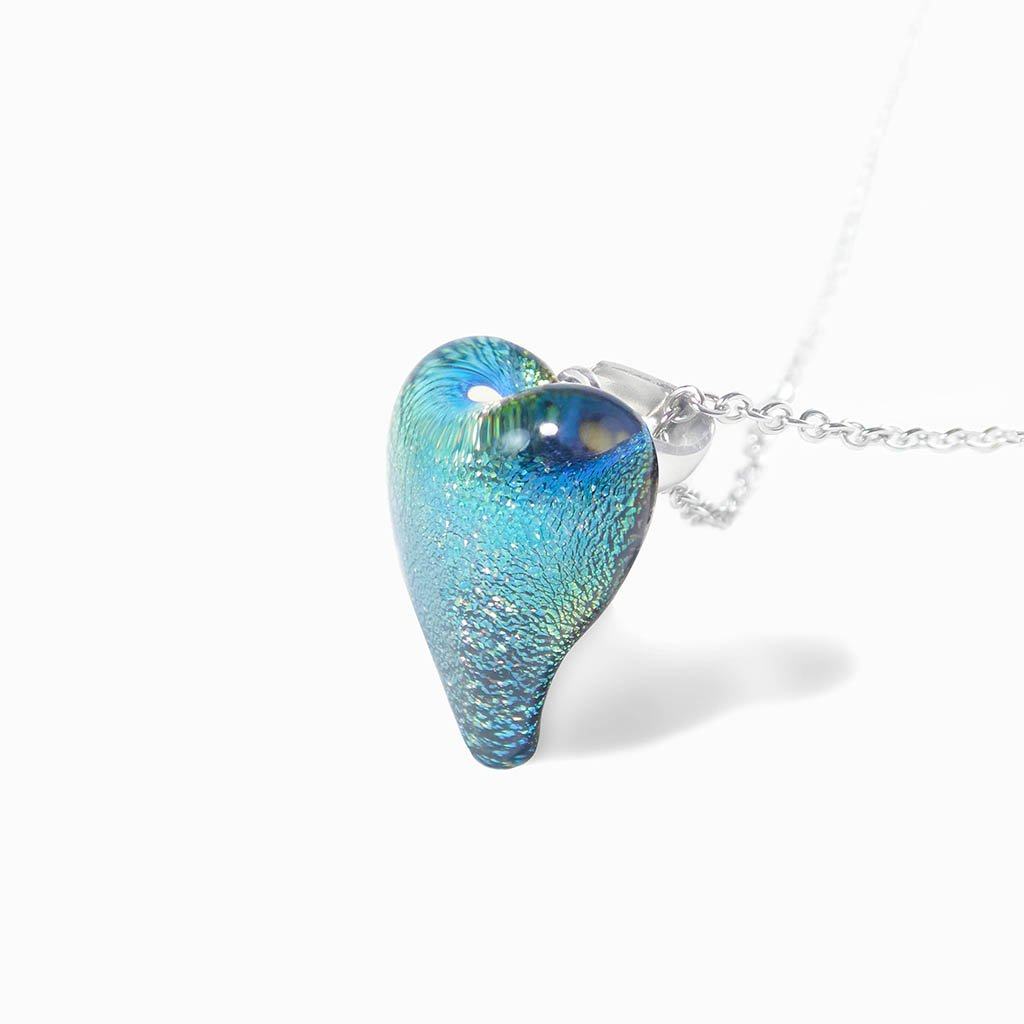 NECKLACE PARME ~ LIGHT GREEN | HEART | REFLET[proNECKLACE PARME ~ LIGHT GREENduct_vendor]MicrocosmosPRODUCT INFORMATION                             

Exlusive Microcosmoses Glass Reflet
Bead size length: 18 mm / 0.7" |  width: 13 mm / 0.5"     

Base chain: SterlinNECKLACE