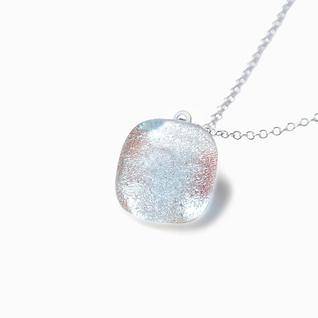 NECKLACE IRIDESCENT WHITE | SQUIRCLE | REFLET[proNECKLACE IRIDESCENT WHITEduct_vendor]MicrocosmosPRODUCT INFORMATION

Exlusive Microcosmoses Glass Reflet
Bead size length: 14 mm / 0.55" |  width: 14 mm / 0.55"

Base chain: Sterling Silver 925 ~ Stainless Steel 
NECKLACE